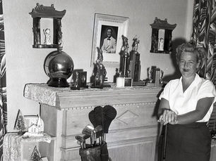 A woman holding a golf club