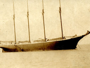 A sailing ship with four masts