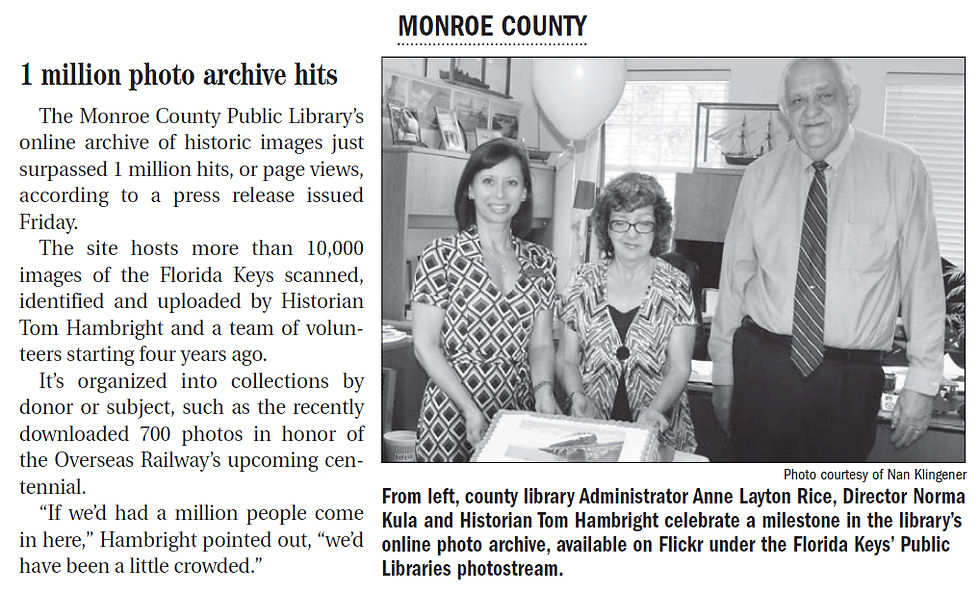 Photo of 3 people and a cake illustrating newspaper story headlined 1 million photo archive hits.