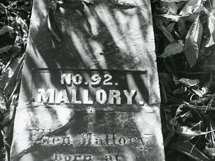 A grave marker inscribed No. 92 MALLORY. Ellen Mallory born at Carrick on Suir 1892 died at Key West May 15, 1855.