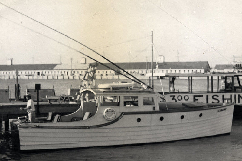 A fishing boat moored at a dock.