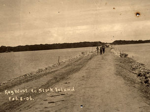 people on a causeway. Text on photo reads Fill - Key West to Stock Island Feb. 8-06.