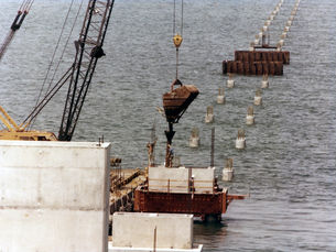 Piers of a bridge under construction in the water.