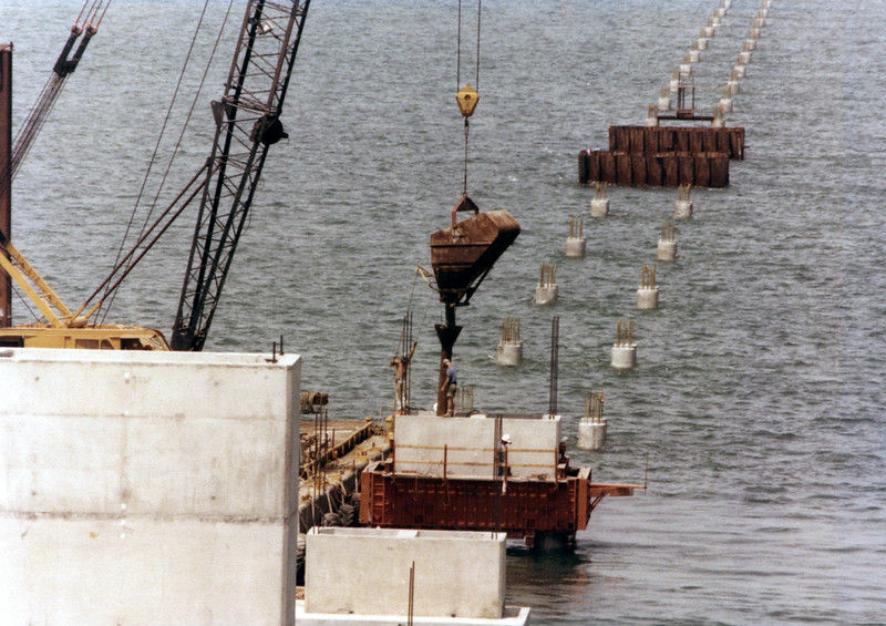Piers of a bridge under construction in the water.