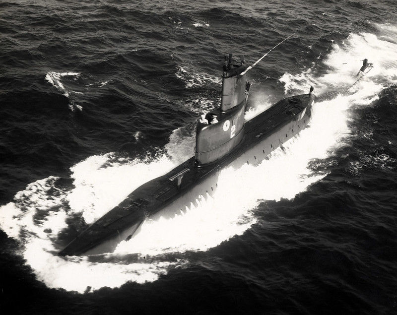A submarine underway on the surface.