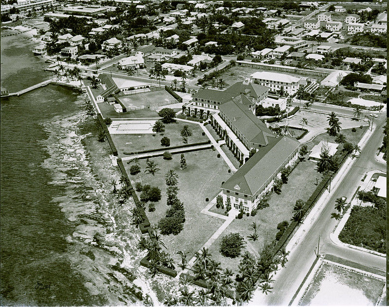 Aerial view of a large building on a shoreline