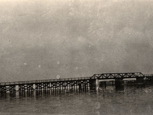 A bridge with a drawbridge in the middle