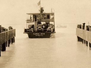 a ferry approaching a slip