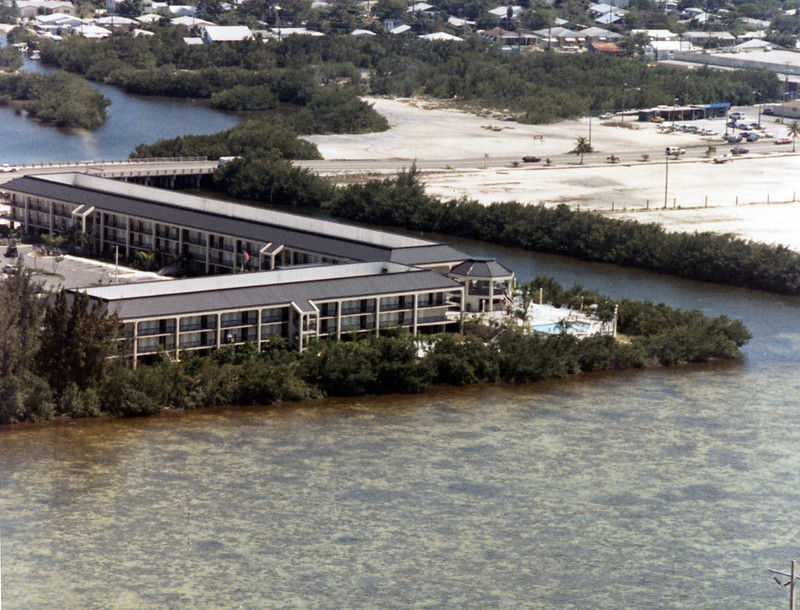 erial view of a three story building on the waterfront.