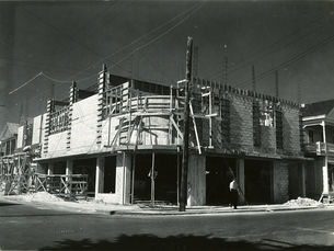 a concrete block building under construction.
