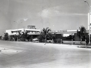 an airport with the framework for a small tower on top