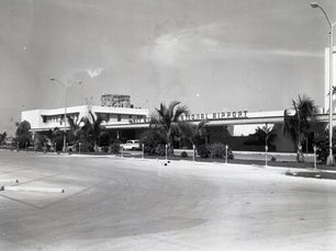 an airport with the framework for a small tower on top