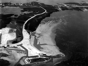 Aerial view of islands with a beach and some development