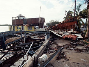 wreckage along a seawall