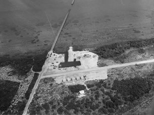 aerial view of an island with an airstrip