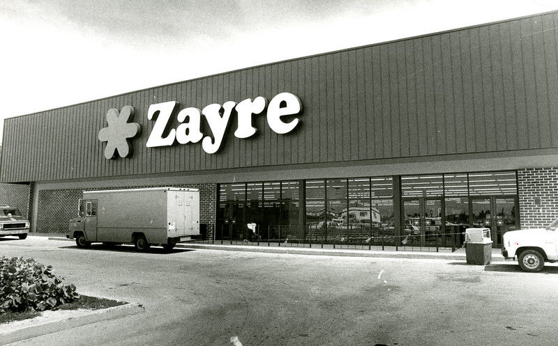 A storefront with a sign that reads Zayre