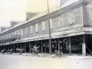 A long elevated building with dormers on the roof